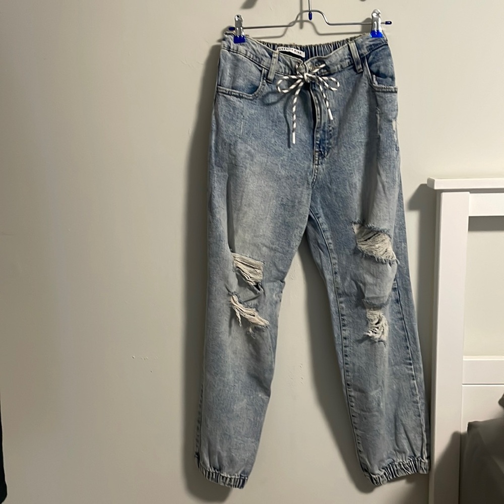 Distressed L vintage denim joggers